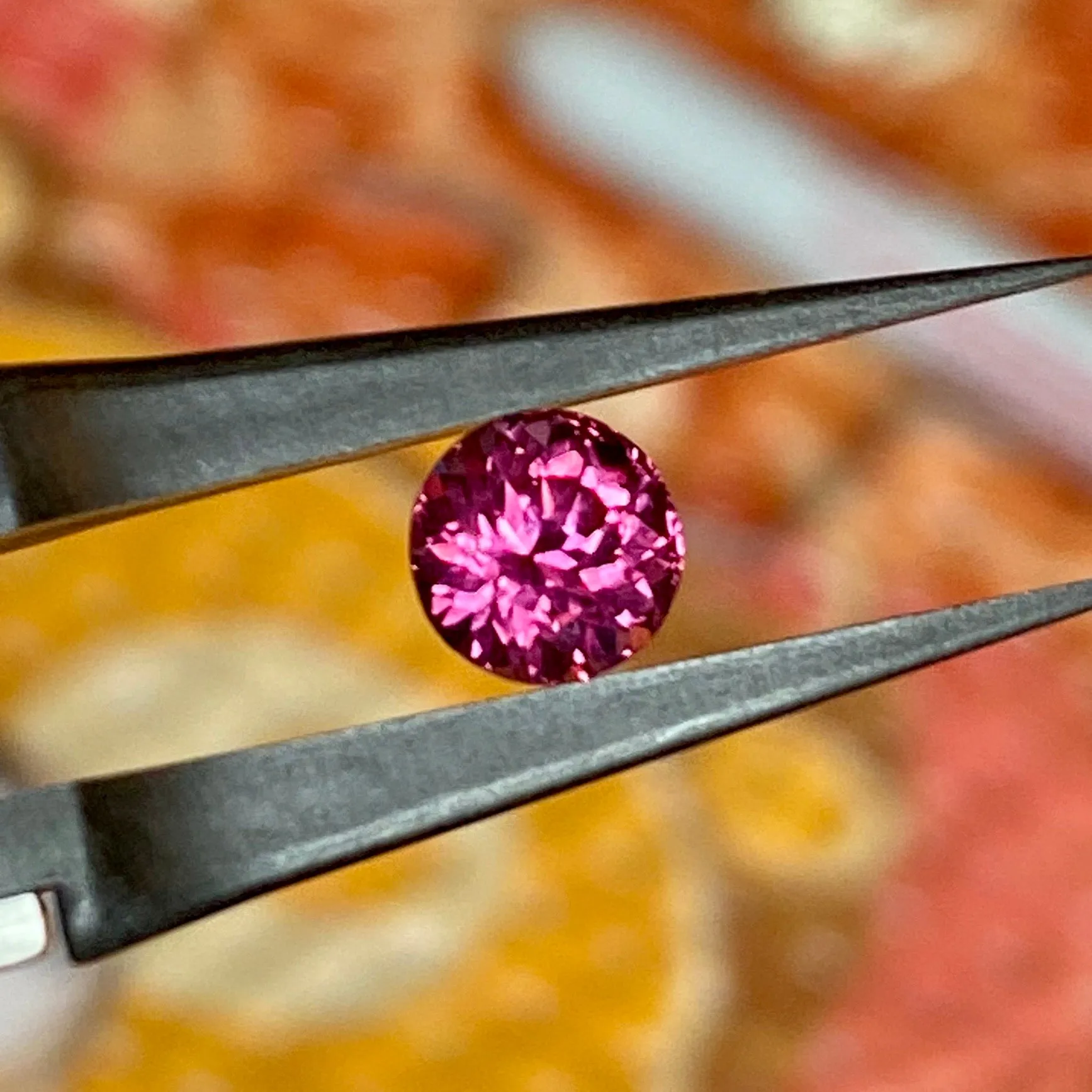 1.30 ct. Garnet Vivid Imperial Round Brilliant Garnet VVS