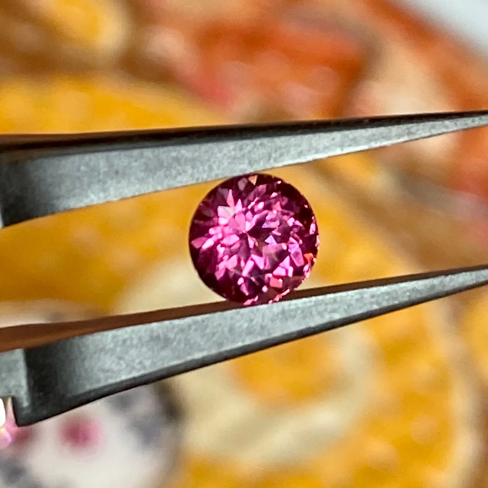 1.30 ct. Garnet Vivid Imperial Round Brilliant Garnet VVS