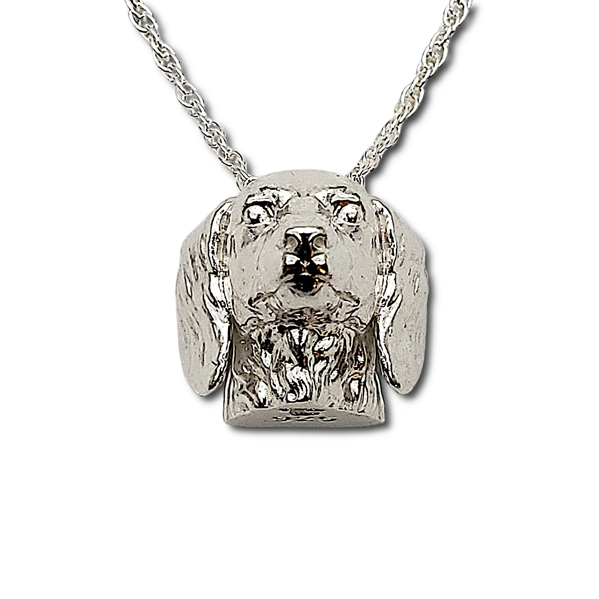 A sterling silver tribute to the  Long-Haired Dachshund