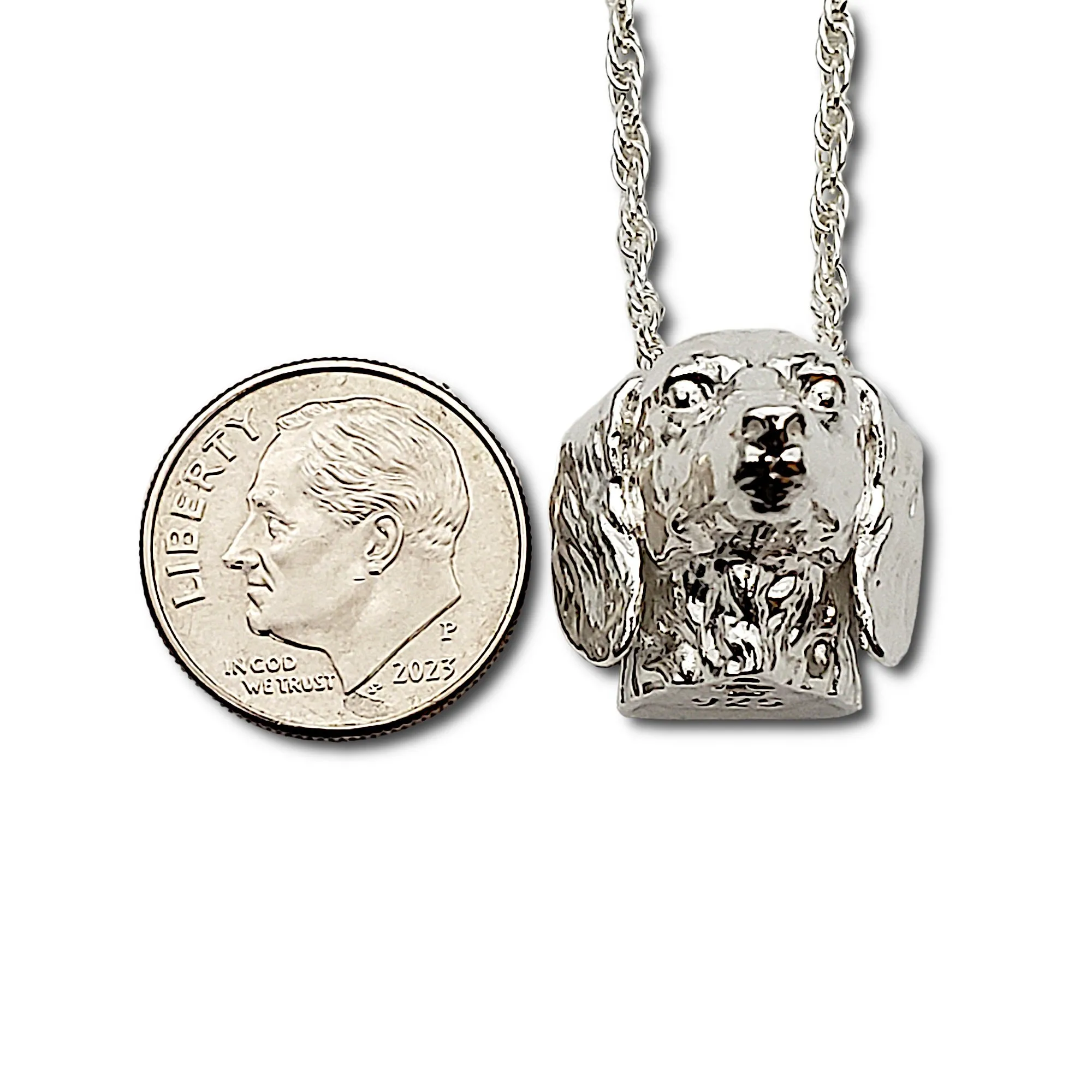 A sterling silver tribute to the  Long-Haired Dachshund