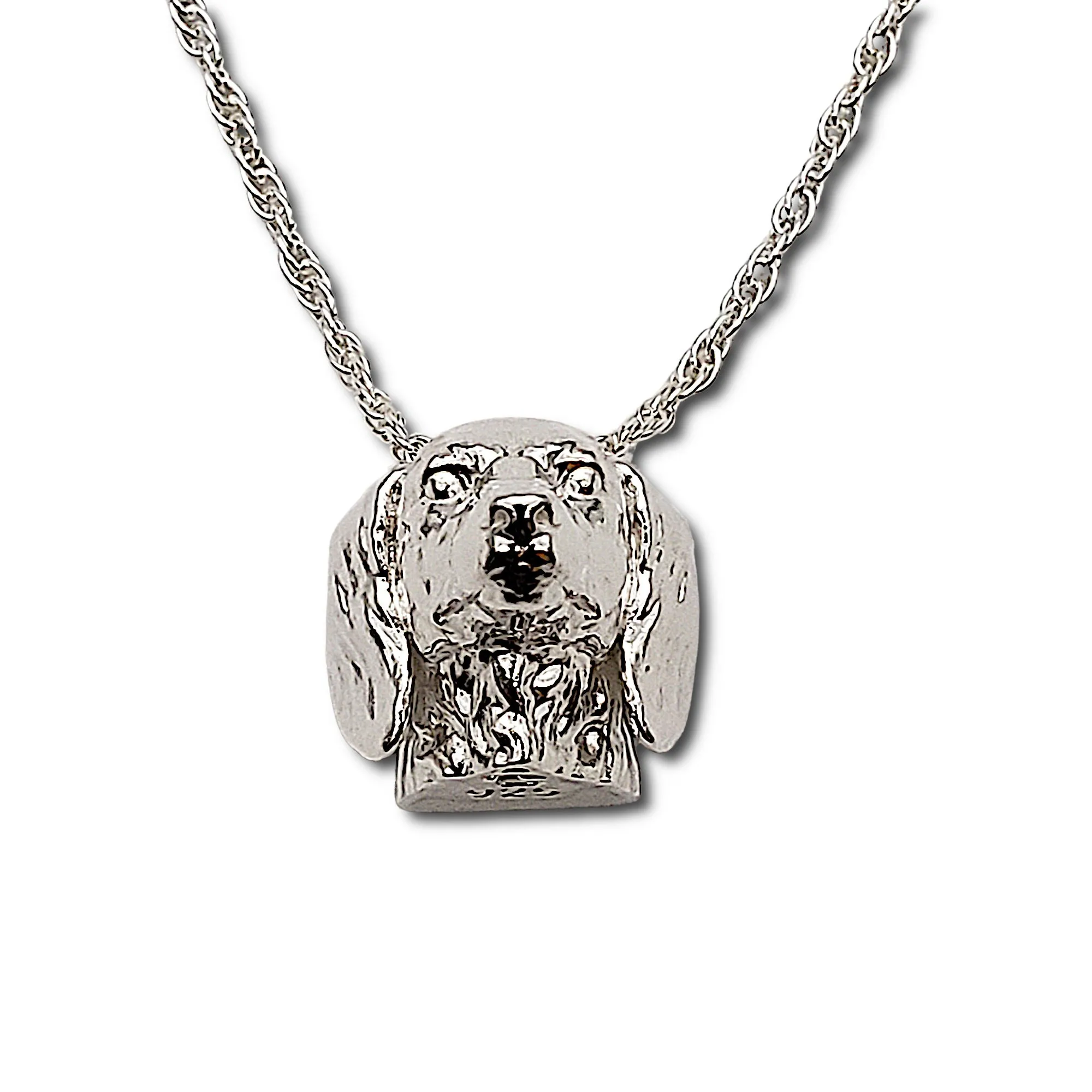 A sterling silver tribute to the  Long-Haired Dachshund