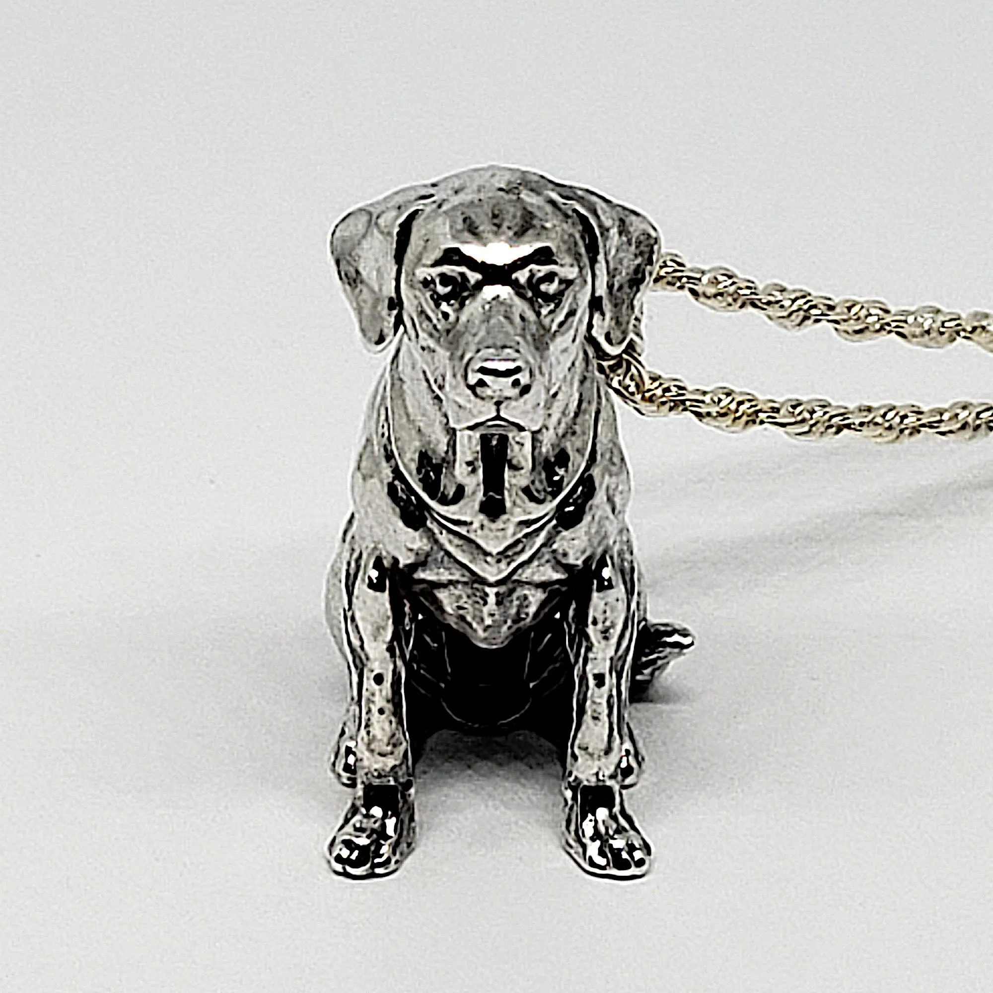 A sterling silver tribute to the Sitting Labrador Retriever!