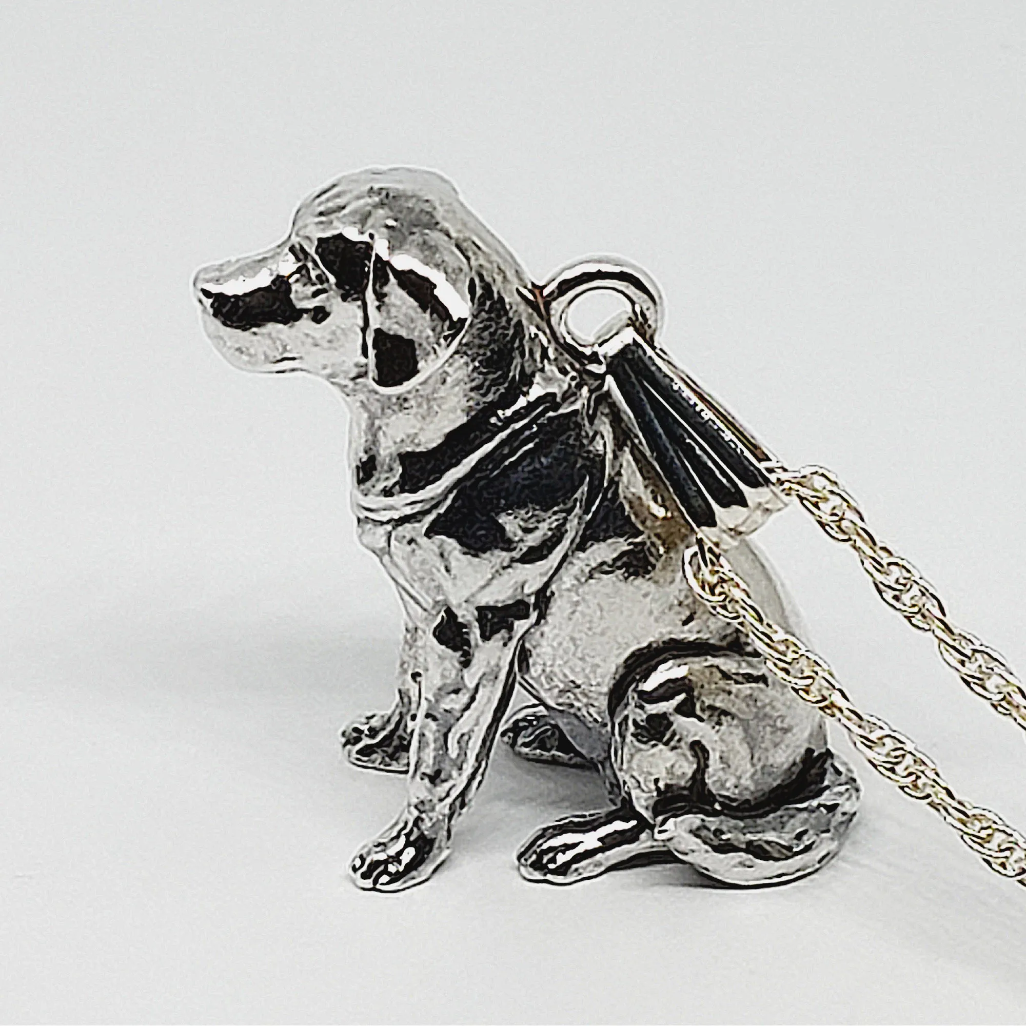 A sterling silver tribute to the Sitting Labrador Retriever!