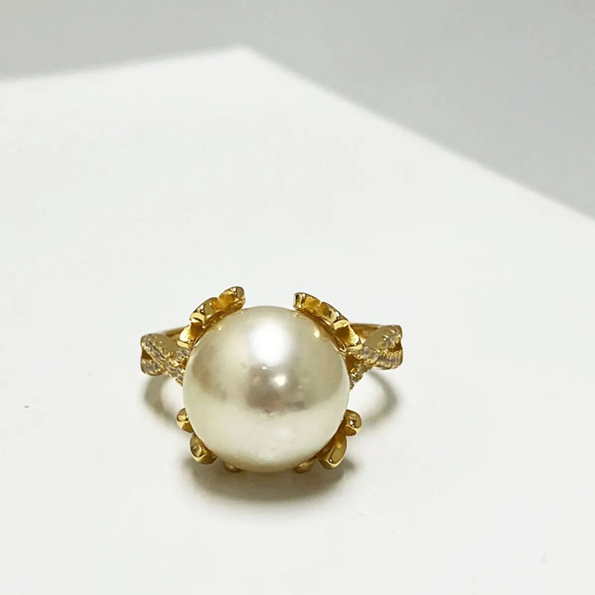Audrey South Sea Gold Pearl Ring Sitting in a Golden Crown