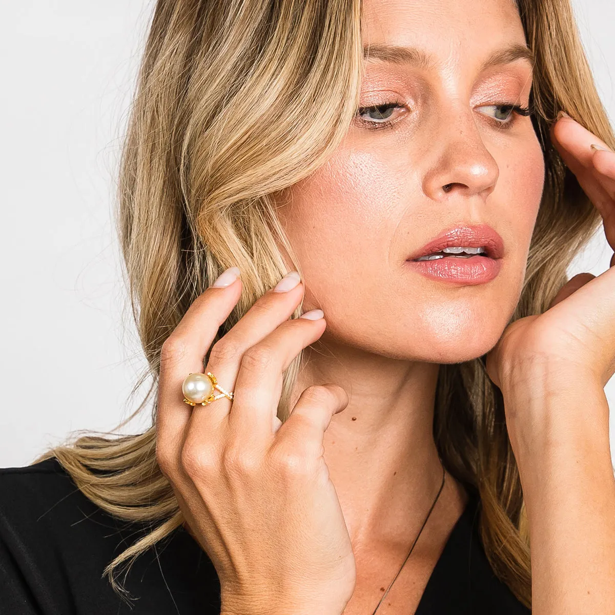 Audrey South Sea Gold Pearl Ring Sitting in a Golden Crown