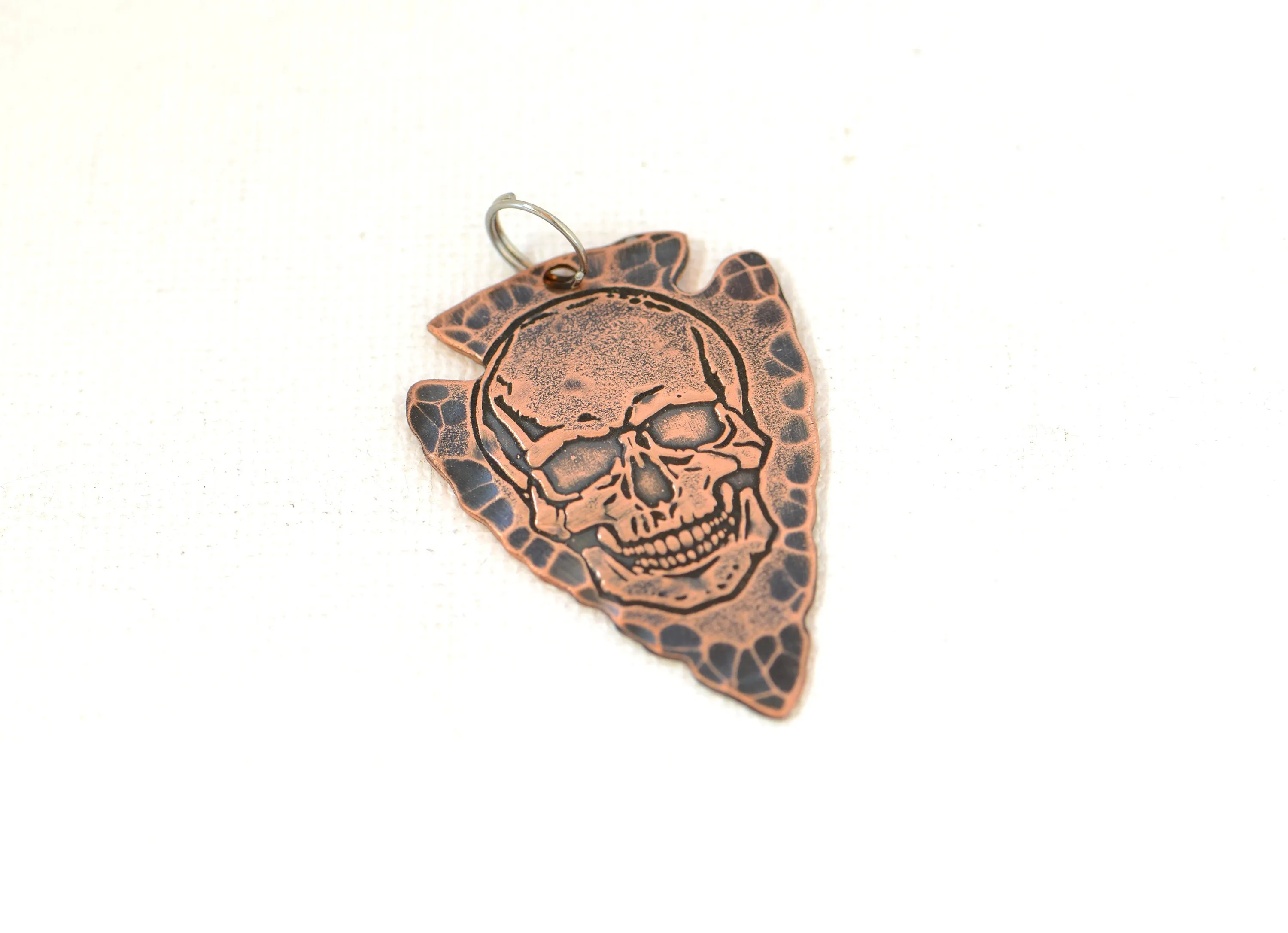 Bad ass skull on arrowhead Necklace in copper
