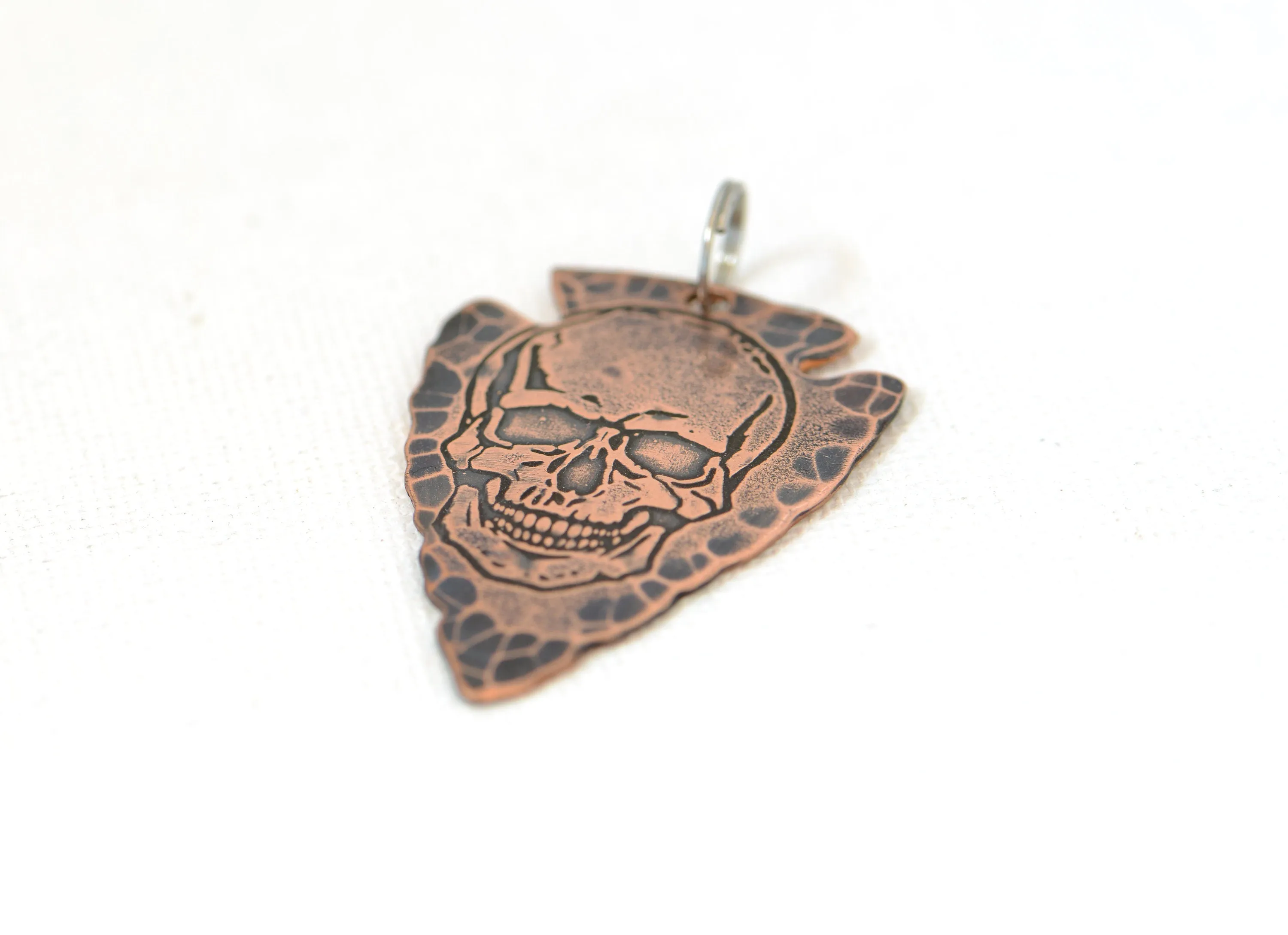Bad ass skull on arrowhead Necklace in copper