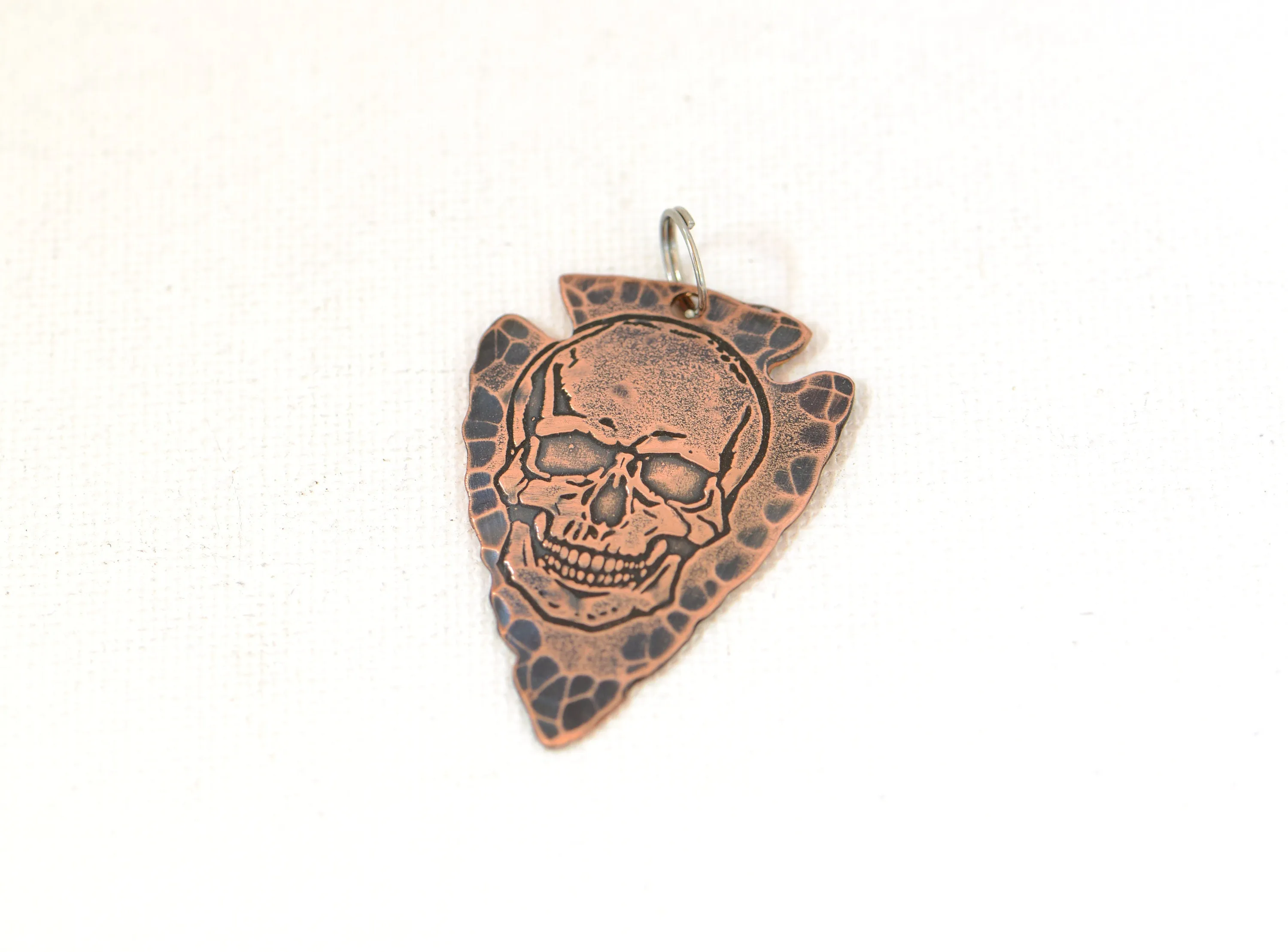 Bad ass skull on arrowhead Necklace in copper