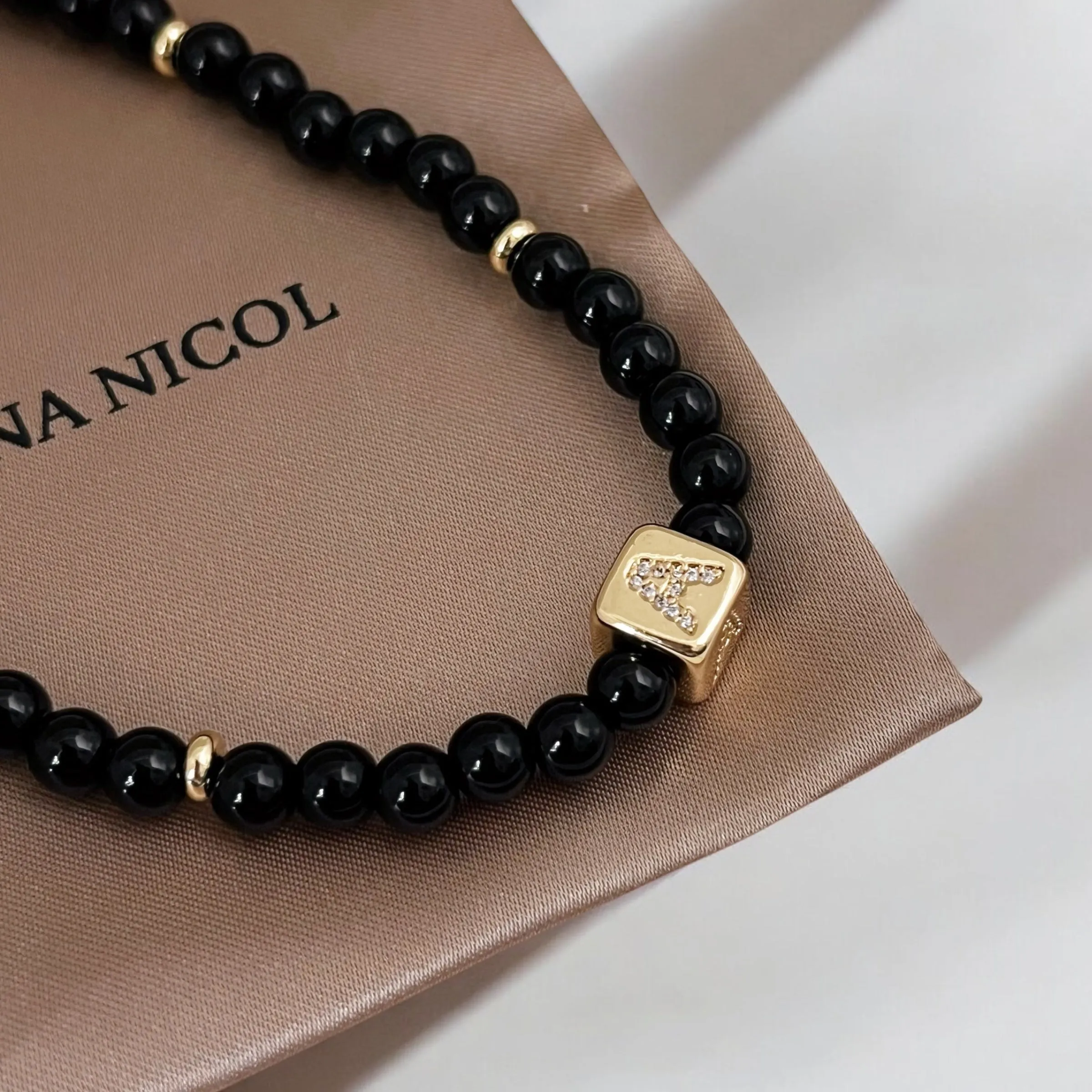 Carry Your Power, Wear Your Initial Onyx Necklace