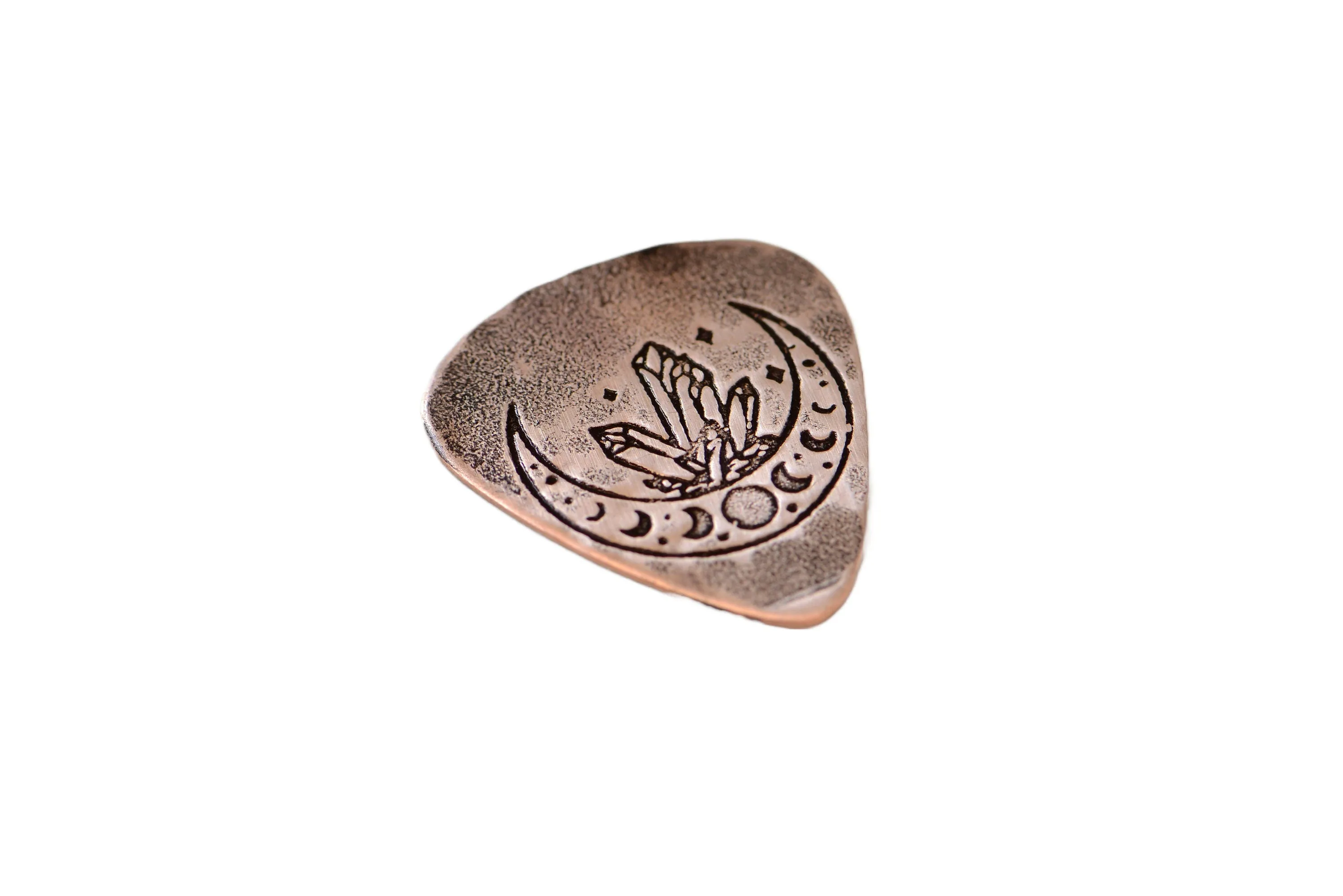 Copper guitar pick with crystal moon