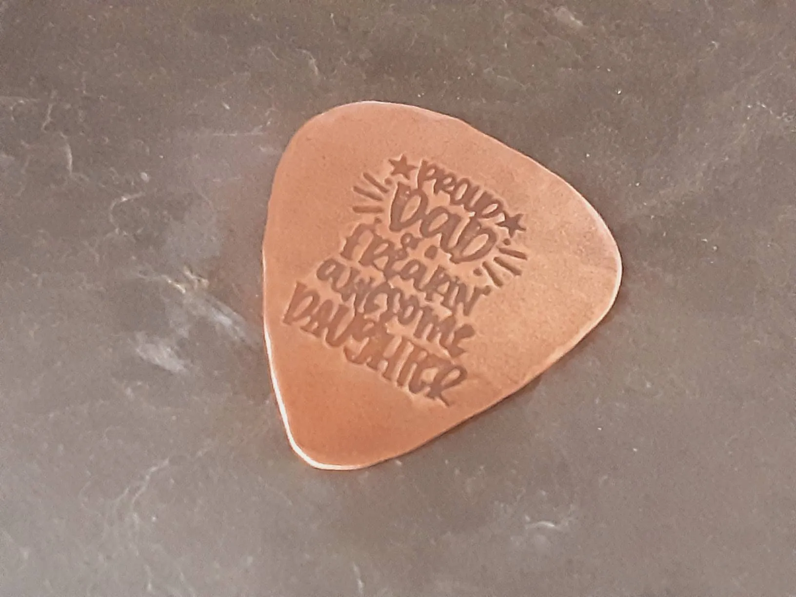 Copper guitar pick