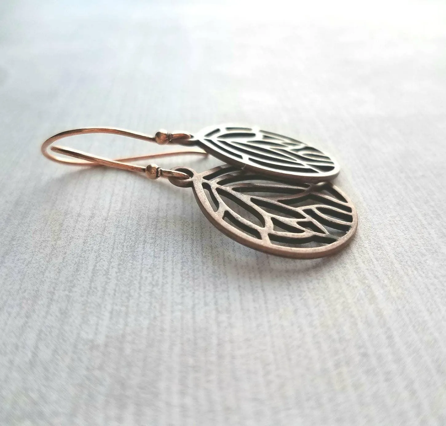 Copper Leaf Earrings - round floral filigree cut out design - light antique finish - simple boho Bohemian unique rustic red brown aged