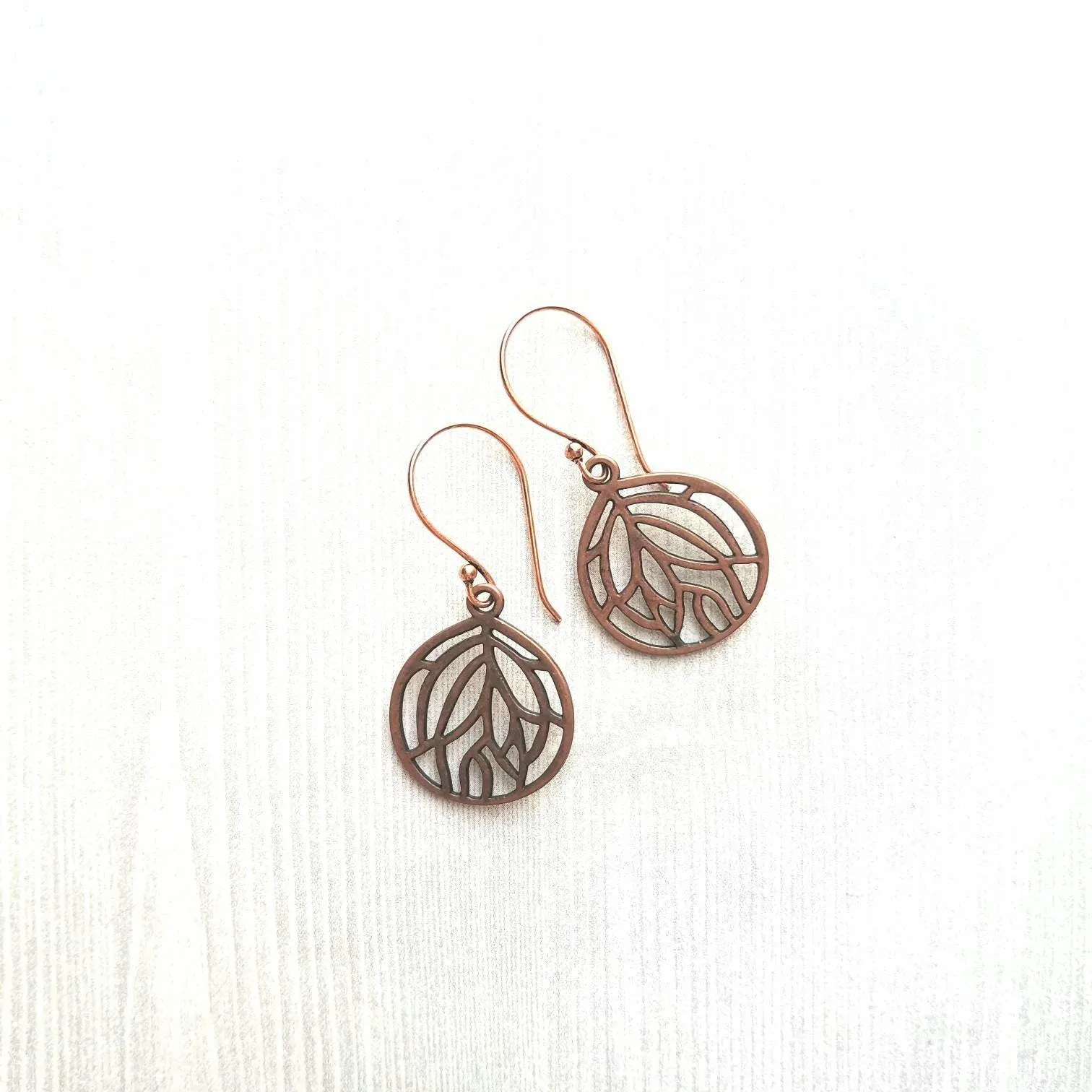 Copper Leaf Earrings - round floral filigree cut out design - light antique finish - simple boho Bohemian unique rustic red brown aged