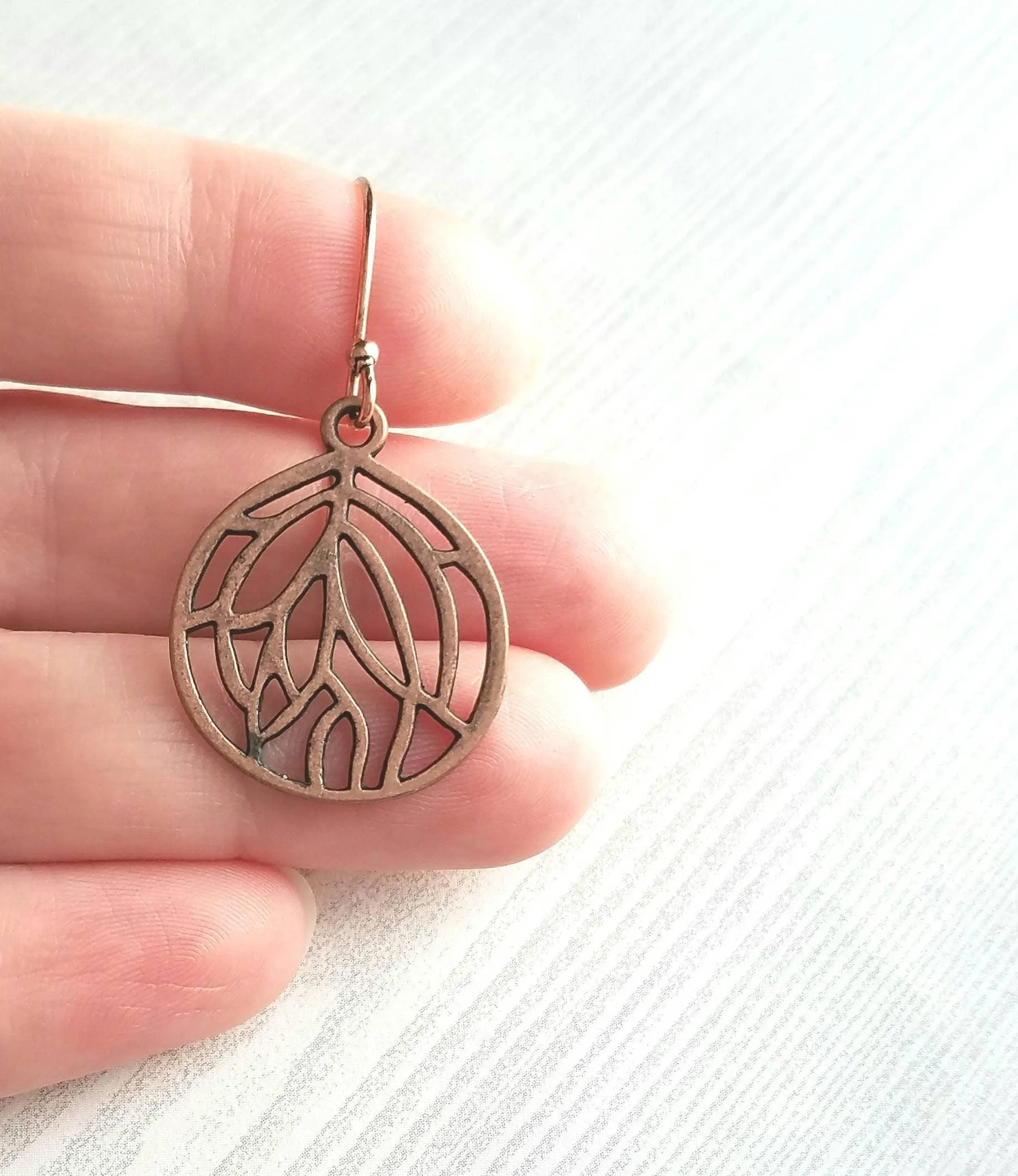 Copper Leaf Earrings - round floral filigree cut out design - light antique finish - simple boho Bohemian unique rustic red brown aged