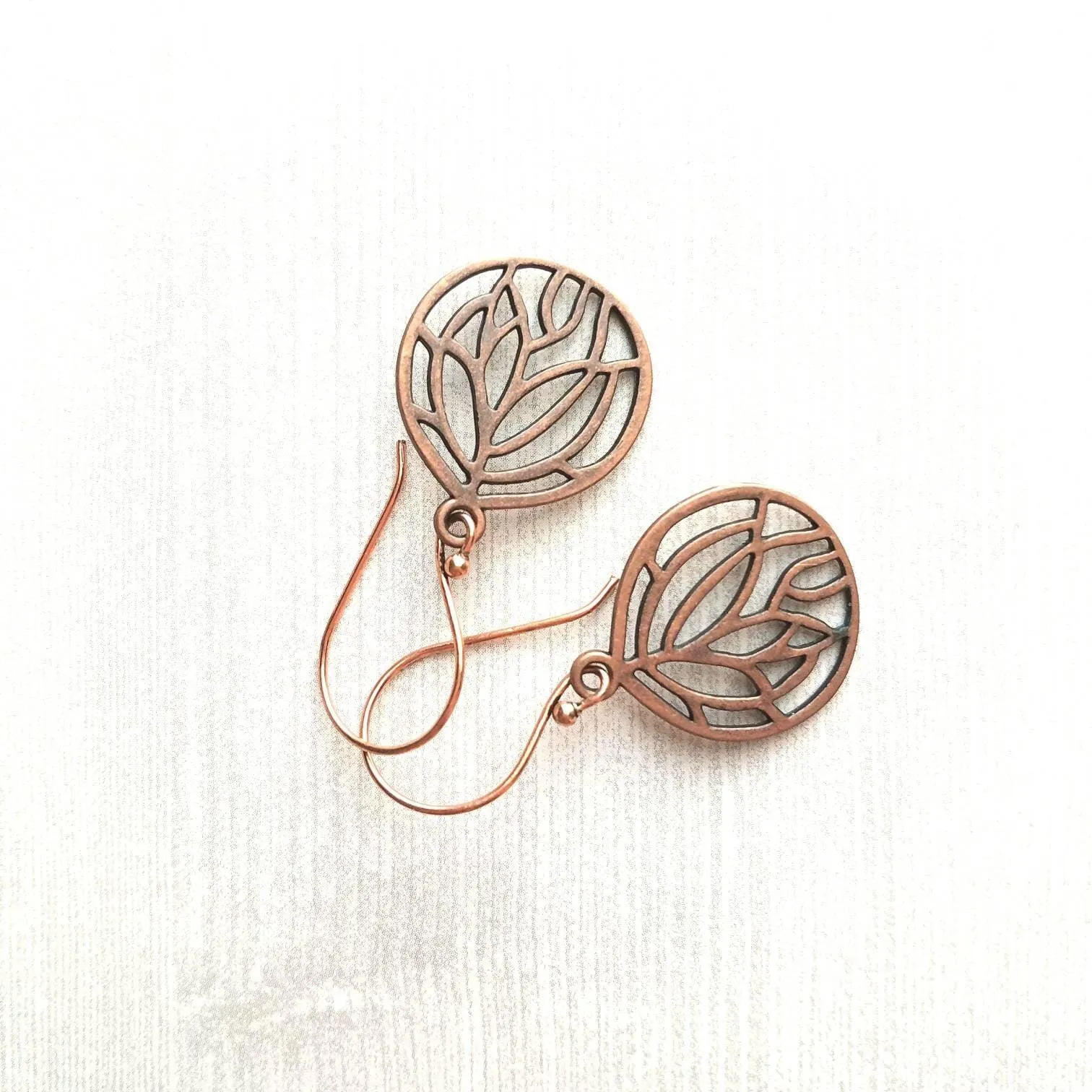 Copper Leaf Earrings - round floral filigree cut out design - light antique finish - simple boho Bohemian unique rustic red brown aged