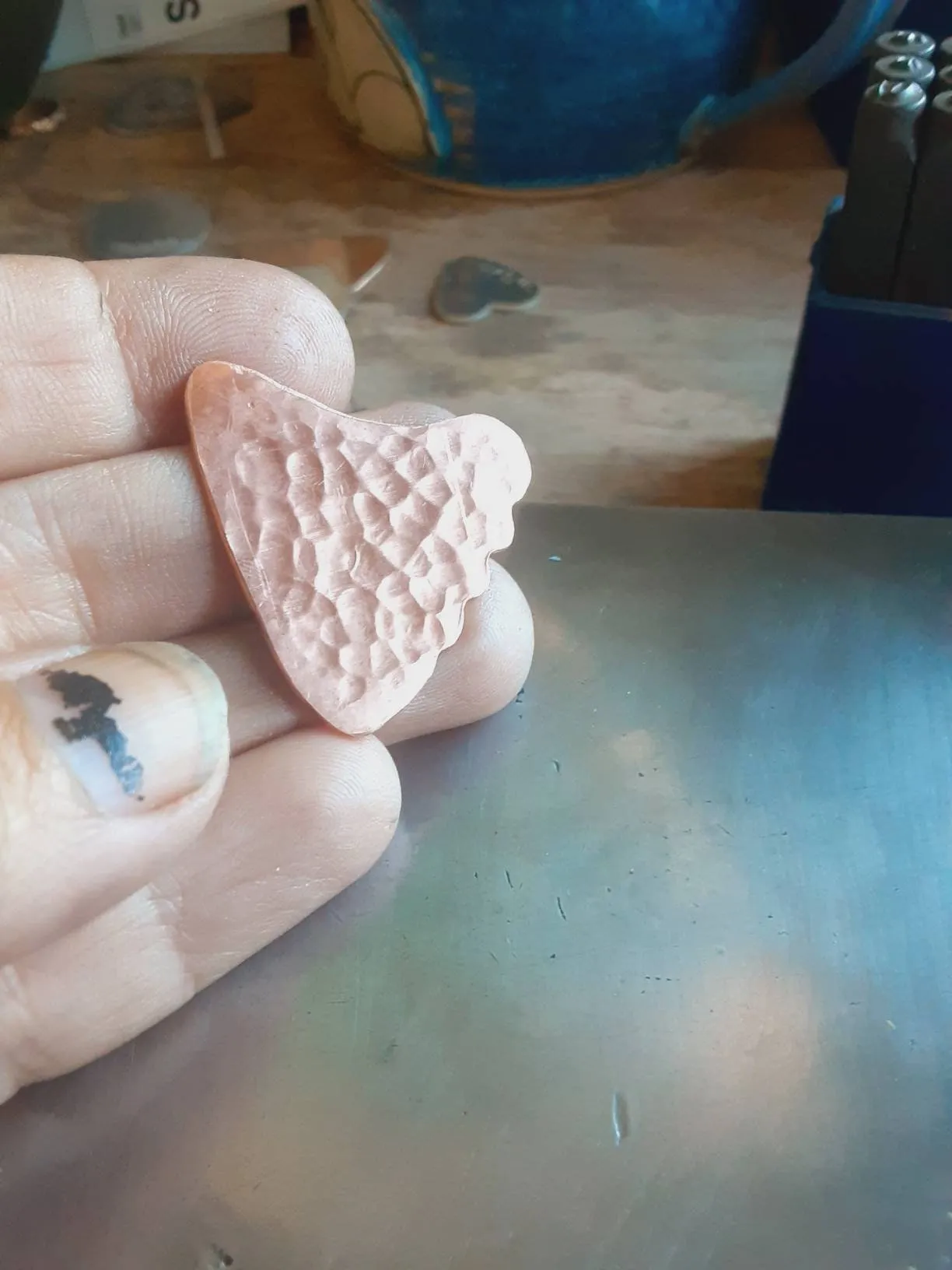 Copper shark tooth guitar pick with scorpion design