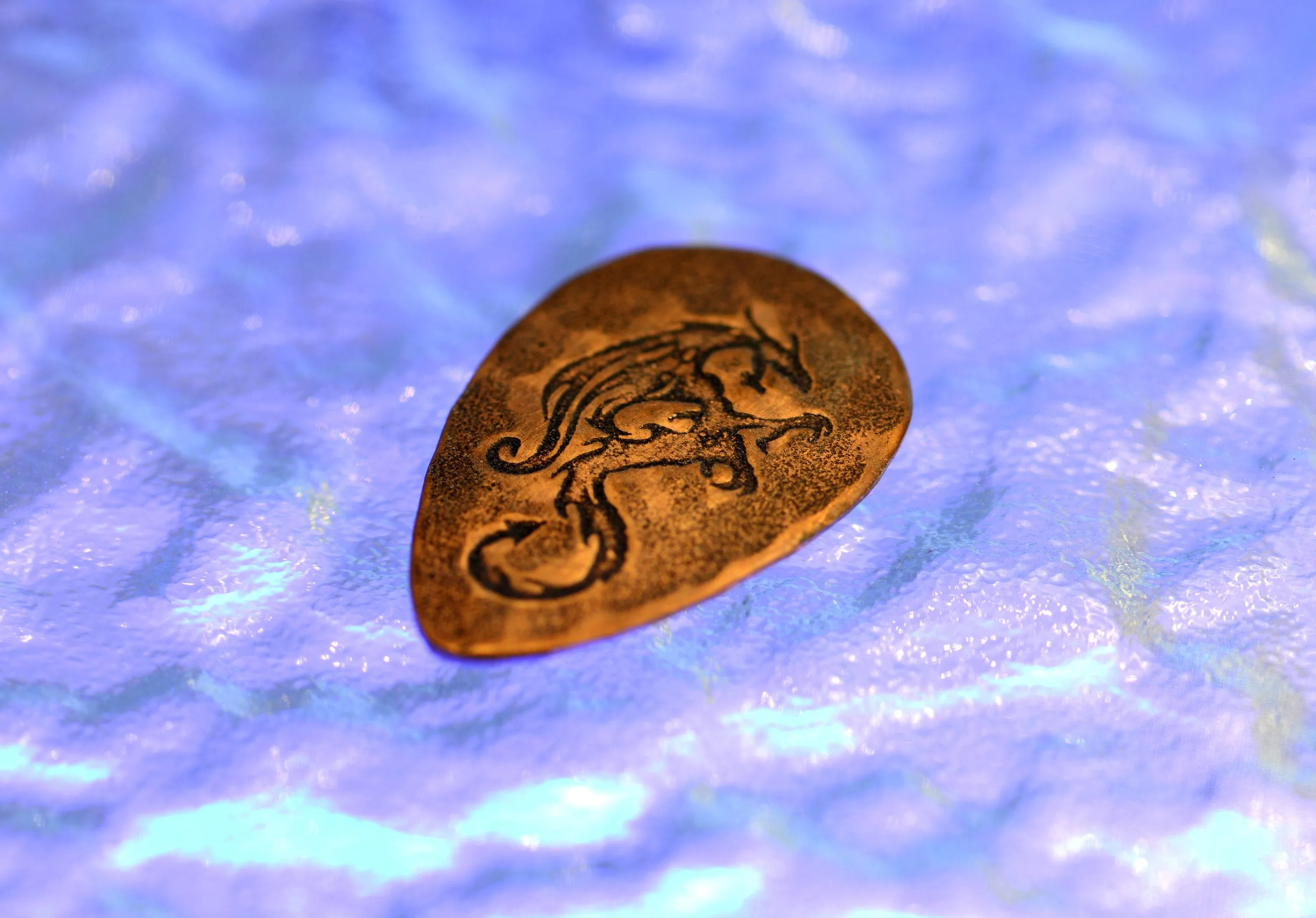 copper tear drop guitar pick with dragon - playable - NicisPicks