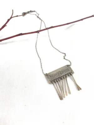 Etched Celtic design on silver necklace