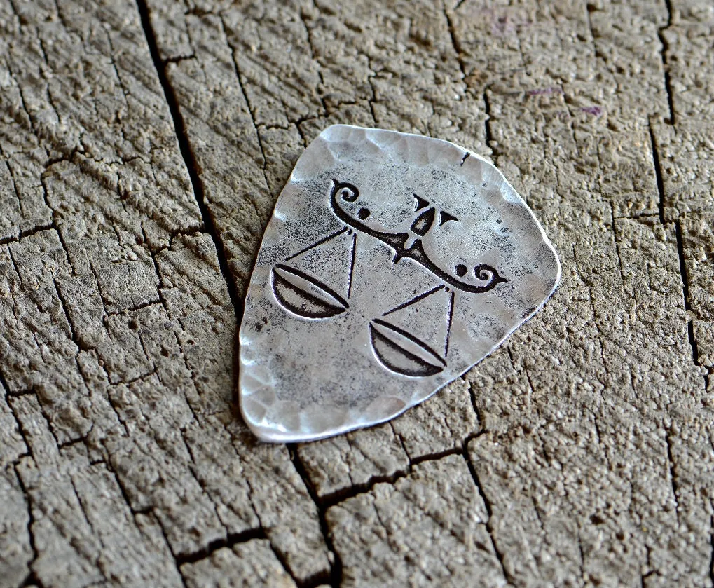 Libra zodiac sign guitar pick in shield shape