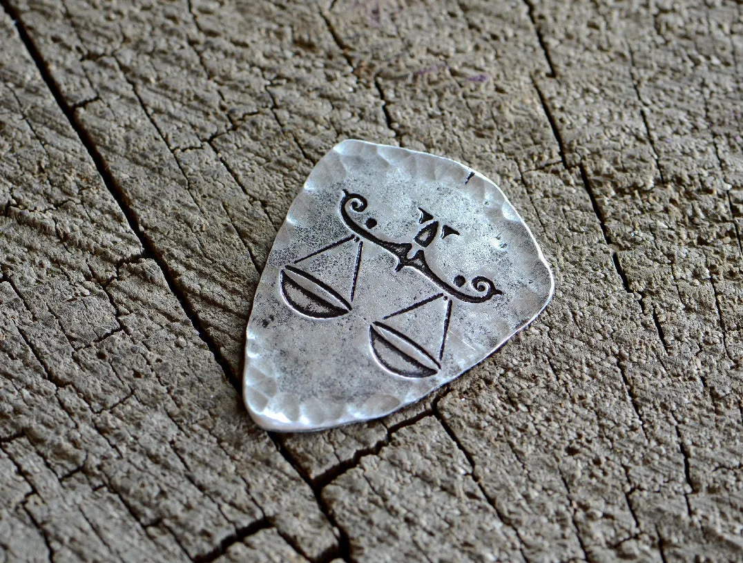 Libra zodiac sign guitar pick in shield shape