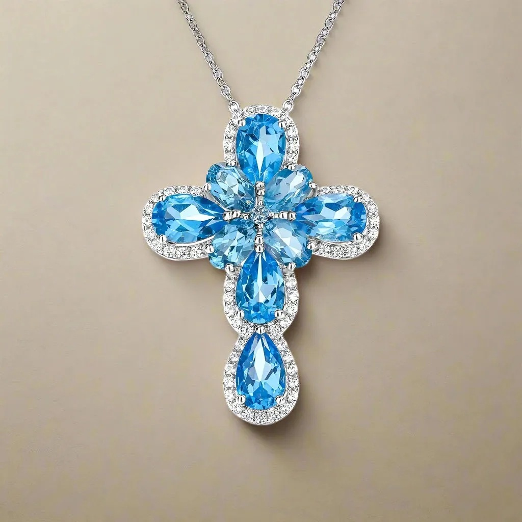 Pear-cut Natural Swiss Blue Halo Cross Necklace