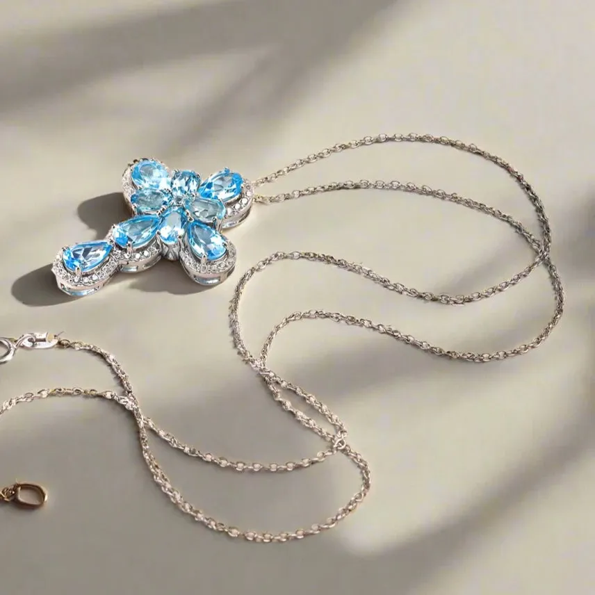 Pear-cut Natural Swiss Blue Halo Cross Necklace