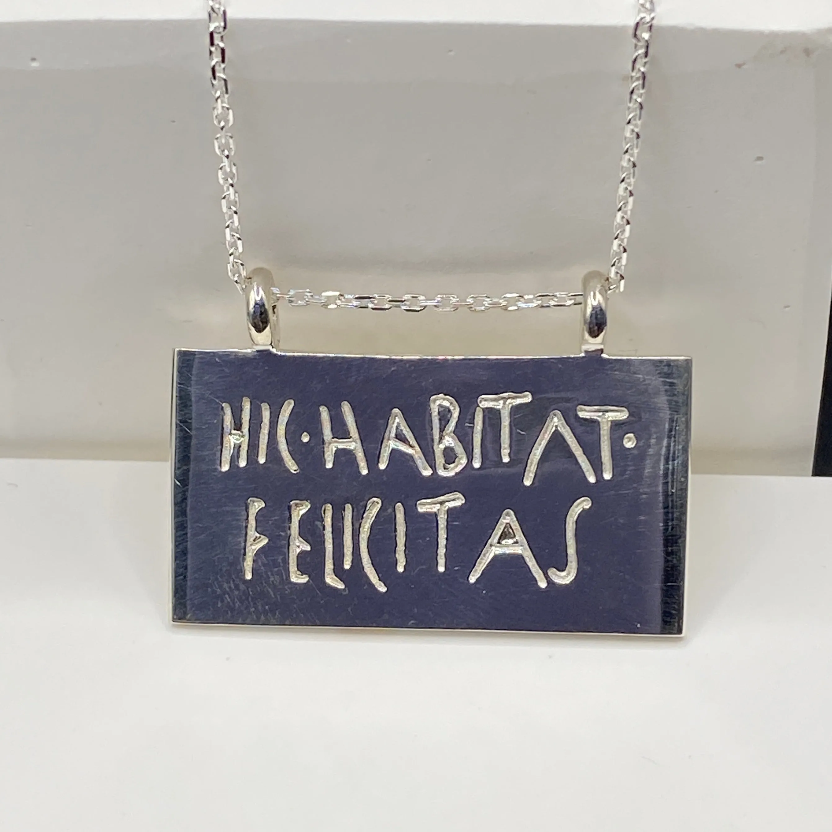 "Happiness Lives Here" Graffito Pendant