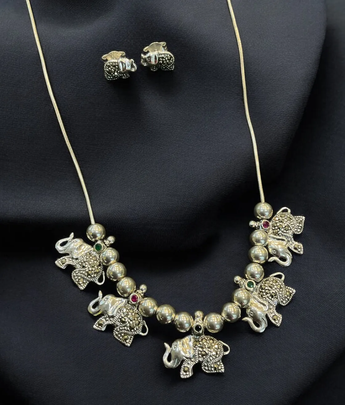 The Glittering Elephant Parade Silver Marcasite Necklace & Earrings