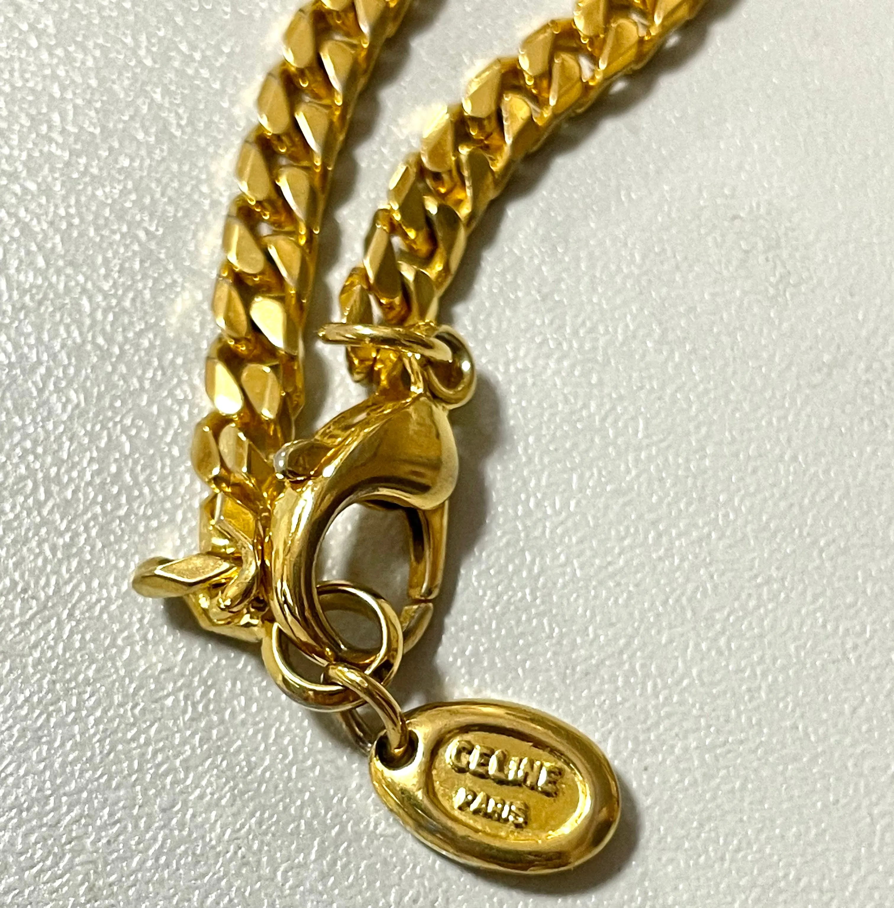 Vintage Celine gold chain long necklace with triomphe charms and blue stones. Can be bracelet. Beautiful statement jewelry. 050817ys1