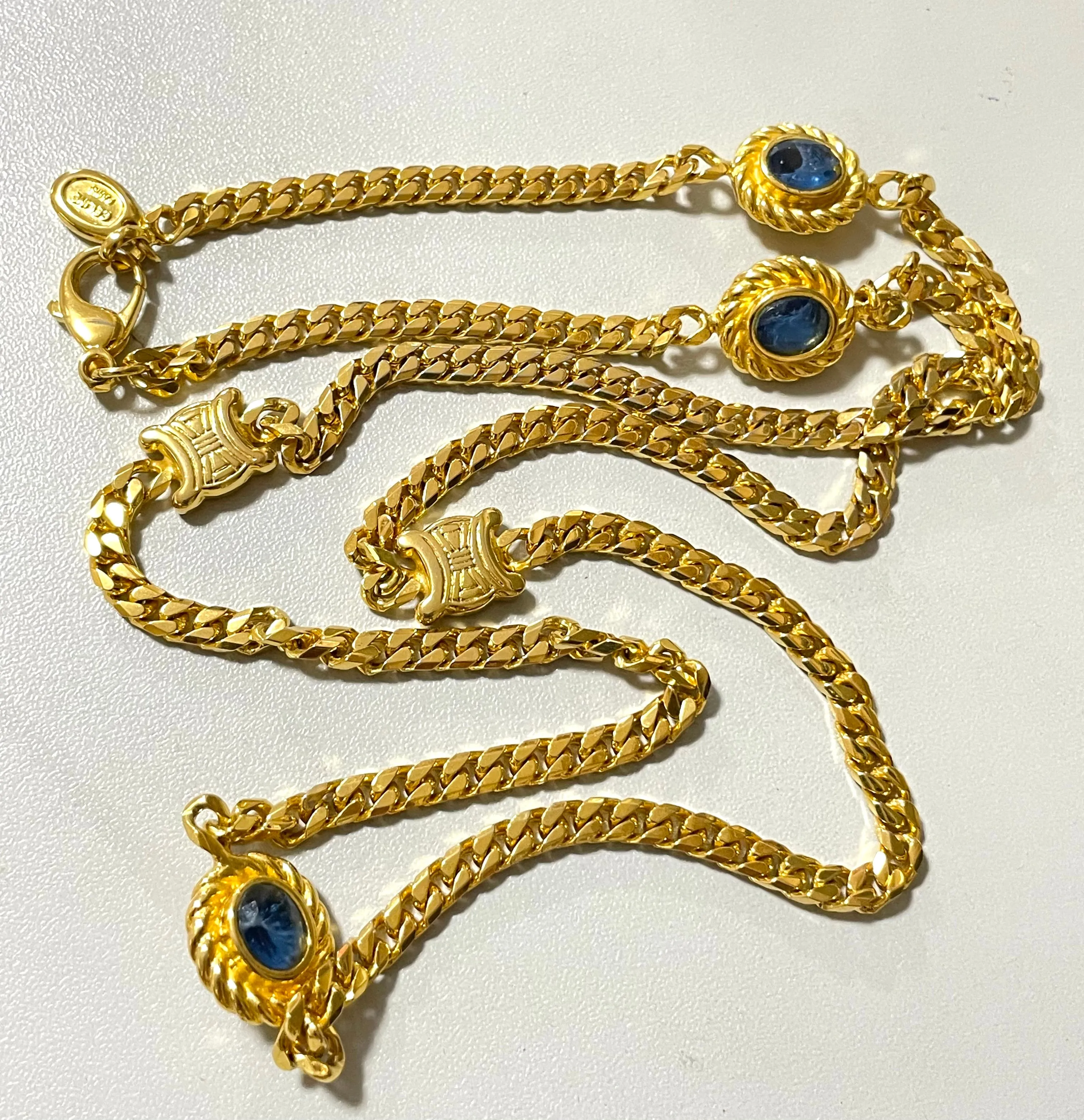 Vintage Celine gold chain long necklace with triomphe charms and blue stones. Can be bracelet. Beautiful statement jewelry. 050817ys1