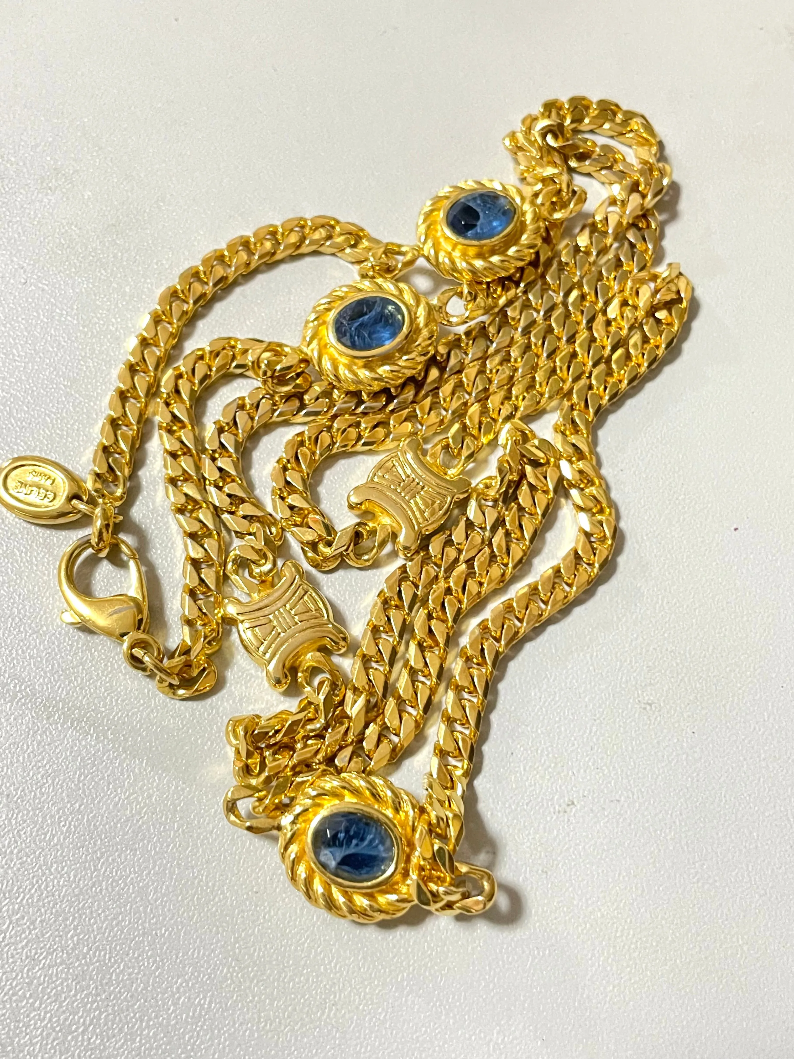 Vintage Celine gold chain long necklace with triomphe charms and blue stones. Can be bracelet. Beautiful statement jewelry. 050817ys1