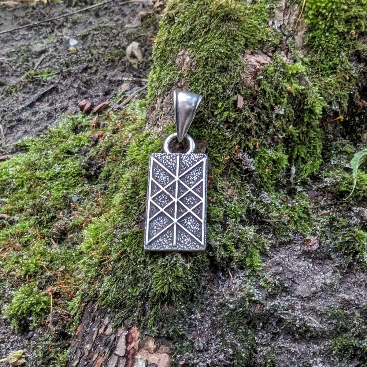 Web of Wyrd bronze pendant