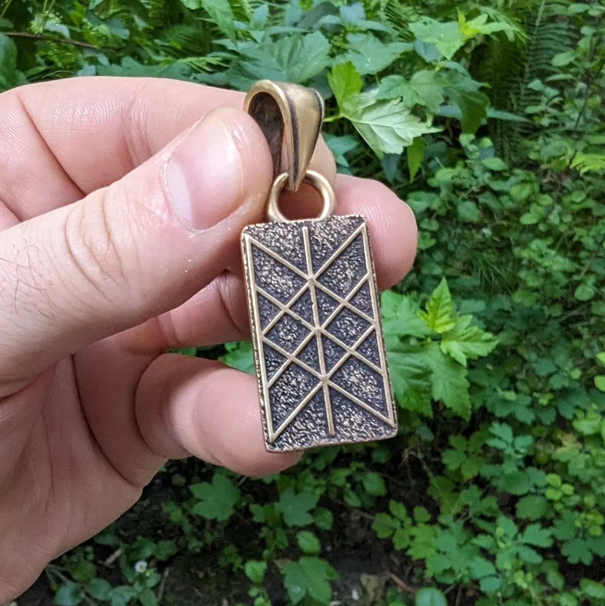 Web of Wyrd bronze pendant