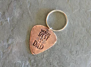Worlds best dad stamped on a copper guitar pick keychain